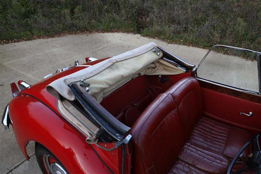 A 1955 Jaguar XK140 DHC